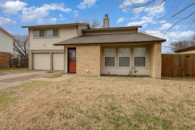 view of front facade featuring brick siding, concrete driveway, an attached garage, a front yard, and fence