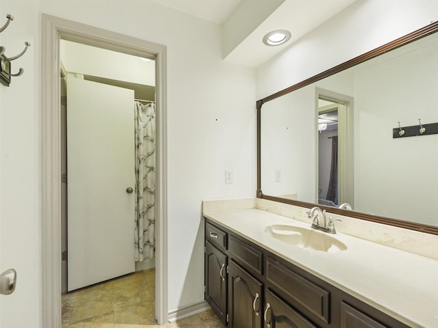 full bathroom featuring vanity