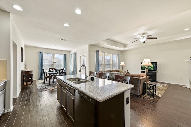 kitchen with visible vents, dark wood-type flooring, a sink, plenty of natural light, and dishwasher