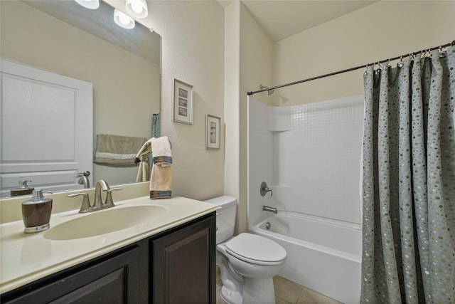 full bathroom with tile patterned flooring, toilet, vanity, and shower / bath combo