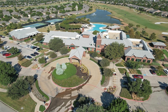 birds eye view of property with a residential view and a water view