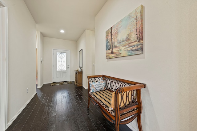 entryway featuring hardwood / wood-style floors and baseboards