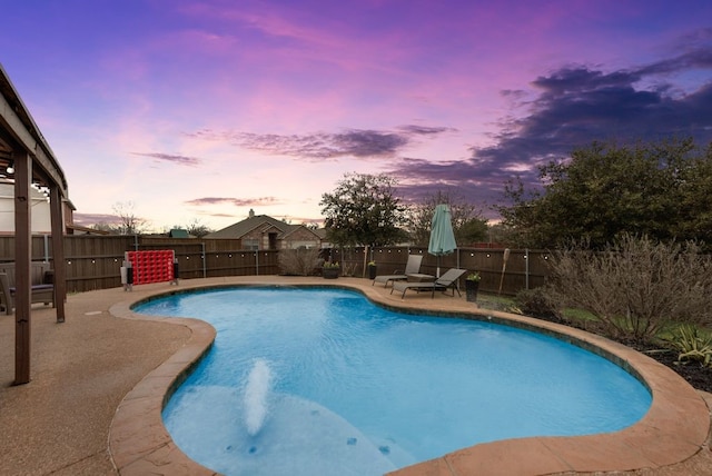 view of pool with a fenced backyard, a fenced in pool, and a patio