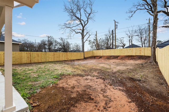 view of yard featuring a fenced backyard