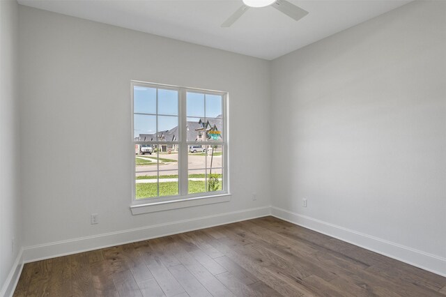 4618 Flat Creek Cv, Tyler, TX 75703 - spare room with plenty of natural light, dark wood finished floors, baseboards, and a ceiling fan