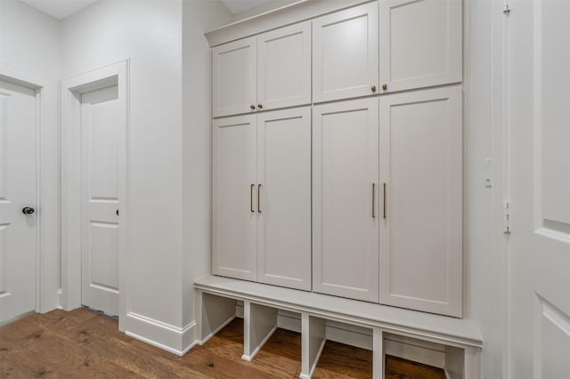 4618 Flat Creek Cv, Tyler, TX 75703 - mudroom with dark wood-type flooring and baseboards