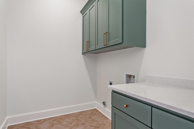 4618 Flat Creek Cv, Tyler, TX 75703 - laundry room featuring cabinet space, washer hookup, hookup for an electric dryer, and baseboards