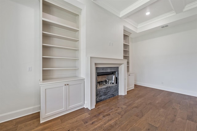 4618 Flat Creek Cv, Tyler, TX 75703 - unfurnished living room with ornamental molding, baseboards, a fireplace, built in shelves, and dark wood-type flooring