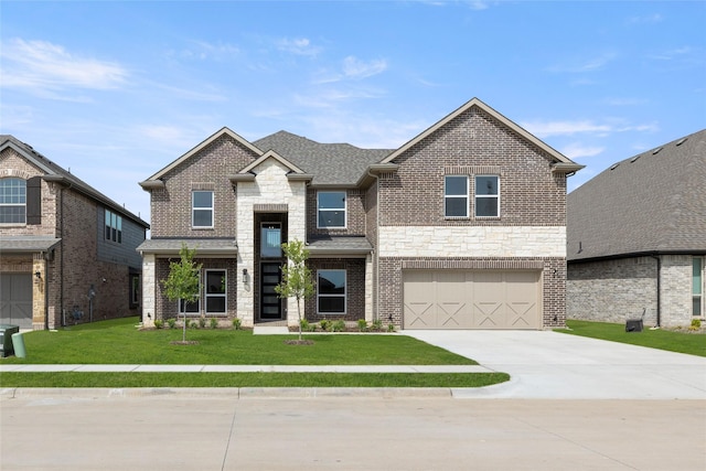 view of front of home with driveway, stone siding, a front lawn, brick siding, and a garage