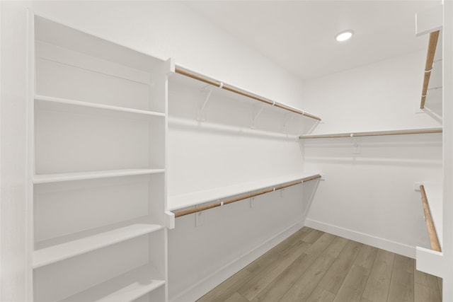 spacious closet with light wood-type flooring