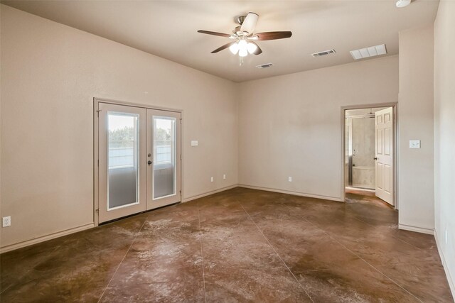 unfurnished room with visible vents, french doors, and ceiling fan