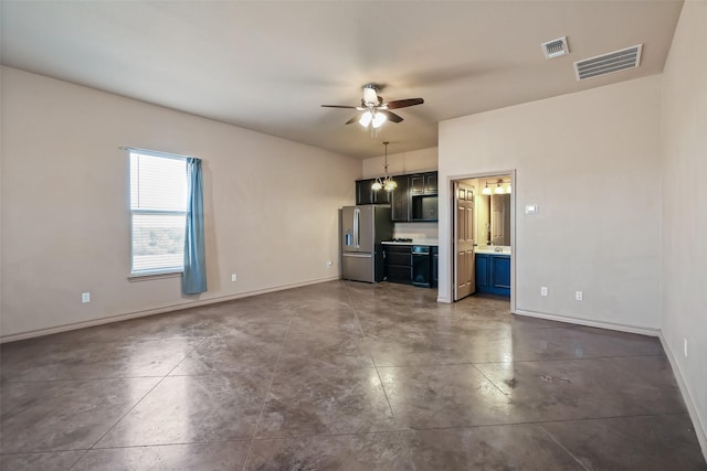 unfurnished living room with visible vents, a ceiling fan, and baseboards