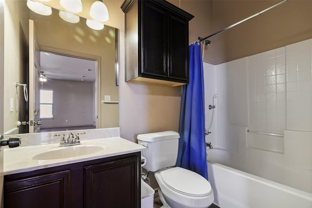 bathroom featuring vanity, shower / bathtub combination with curtain, and toilet