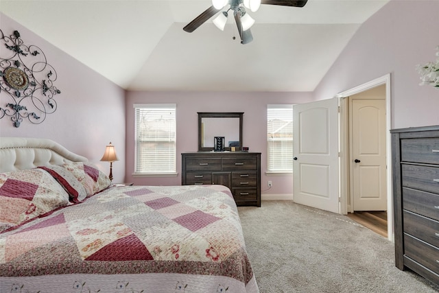 bedroom with light carpet, baseboards, a ceiling fan, and lofted ceiling