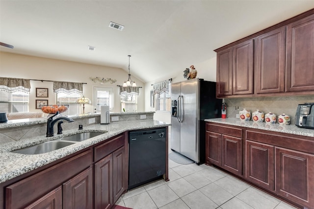 kitchen featuring black dishwasher, tasteful backsplash, visible vents, a sink, and stainless steel fridge with ice dispenser