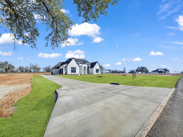 view of street featuring driveway