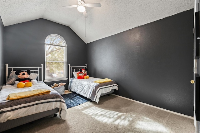 carpeted bedroom featuring lofted ceiling, a ceiling fan, and a textured ceiling