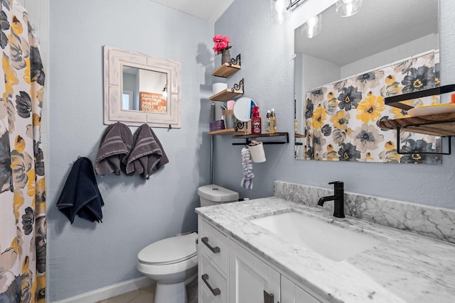 full bathroom featuring a shower with shower curtain, tile patterned flooring, vanity, and toilet