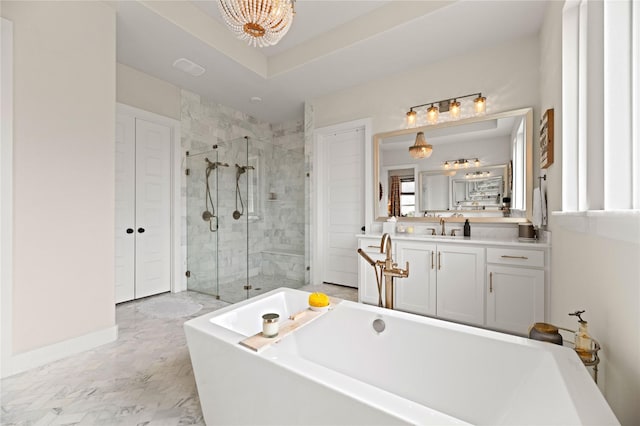 full bath with vanity, a shower stall, marble finish floor, and a freestanding bath