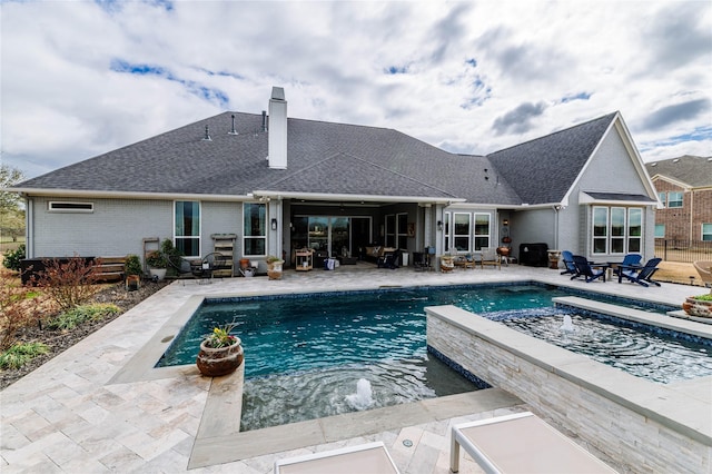 pool with a patio