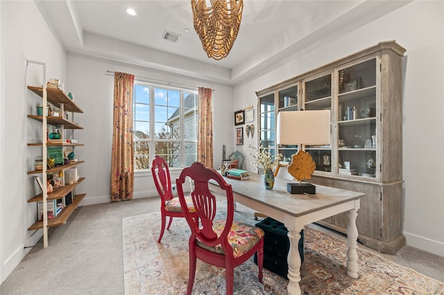 office area with baseboards, visible vents, carpet floors, a tray ceiling, and recessed lighting