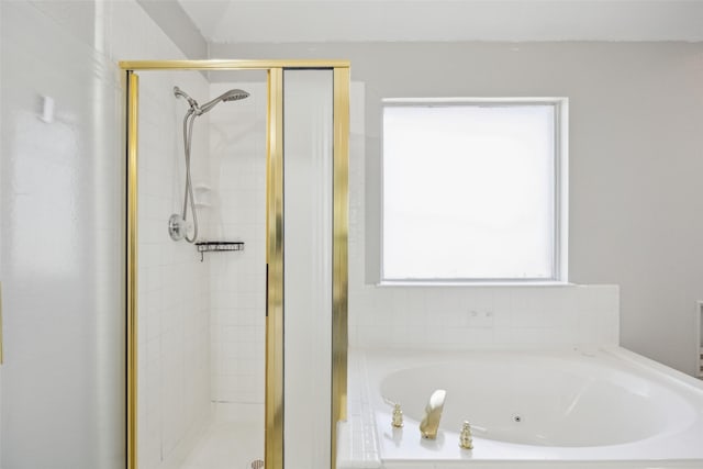 1153 Regal Dr, Garland, TX 75040 - full bath with a stall shower and a jetted tub