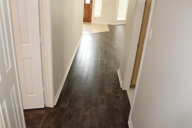 8509 Mustang Dr, Irving, TX 75063 - corridor with dark wood finished floors and baseboards