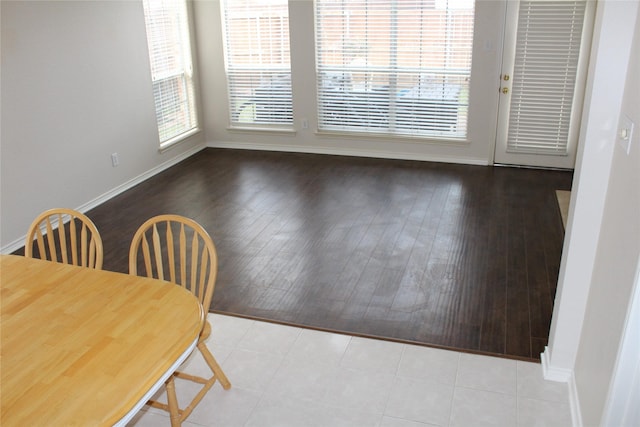 8509 Mustang Dr, Irving, TX 75063 - dining room with baseboards and wood finished floors
