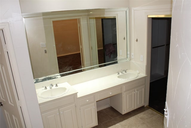 8509 Mustang Dr, Irving, TX 75063 - full bath featuring double vanity, tile patterned floors, and a sink