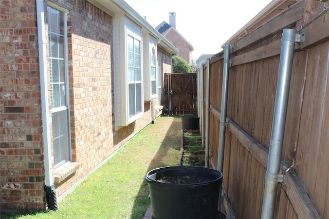 8509 Mustang Dr, Irving, TX 75063 - view of yard featuring a gate and fence