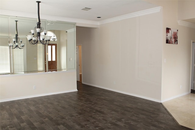 8509 Mustang Dr, Irving, TX 75063 - unfurnished dining area featuring wood finished floors, visible vents, and ornamental molding
