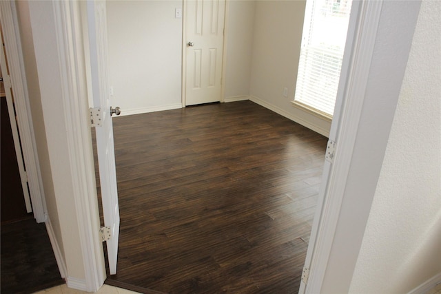 8509 Mustang Dr, Irving, TX 75063 - interior space with dark wood finished floors and baseboards