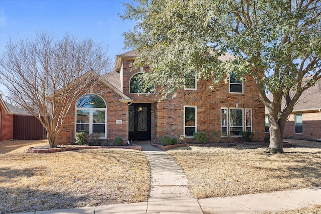 view of front of property with brick siding