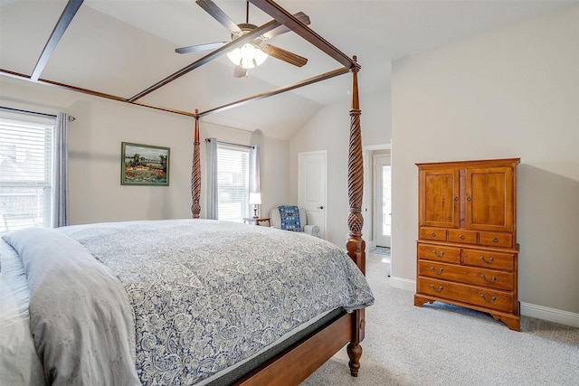 bedroom featuring lofted ceiling, baseboards, a ceiling fan, and light colored carpet