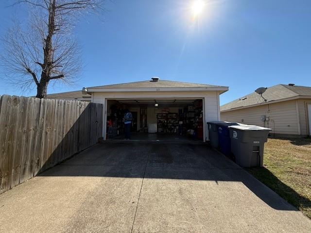 detached garage with fence