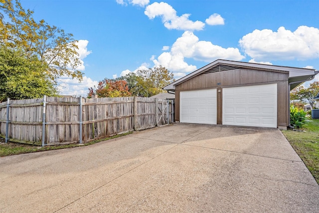 garage with fence