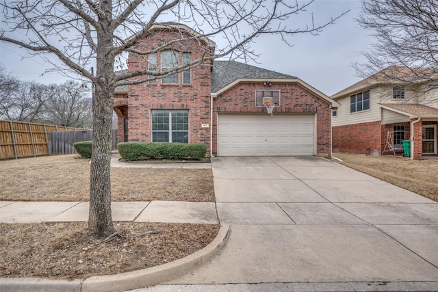 traditional-style home featuring brick siding, a shingled roof, fence, concrete driveway, and an attached garage