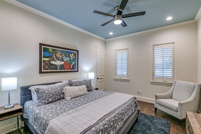 bedroom featuring recessed lighting, baseboards, crown molding, and wood finished floors