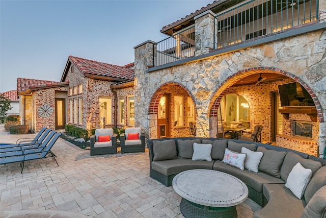 view of patio / terrace featuring outdoor lounge area and a balcony