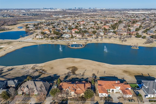 bird's eye view with a water view and a residential view