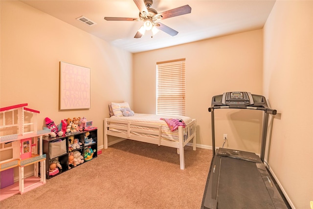 bedroom featuring ceiling fan, carpet, visible vents, and baseboards