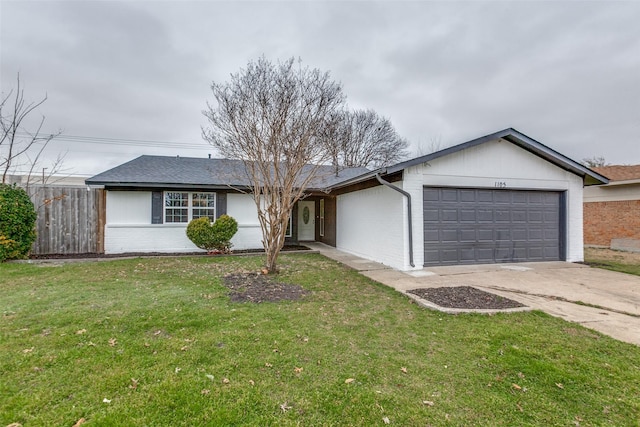 ranch-style house with a garage, driveway, a front lawn, and brick siding