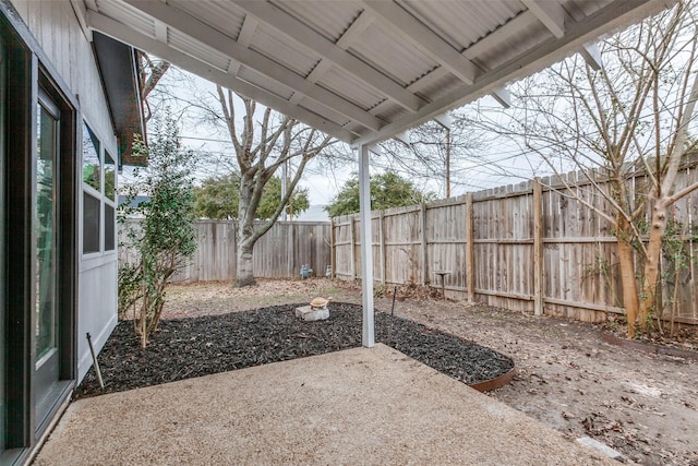 view of yard with a fenced backyard and a patio