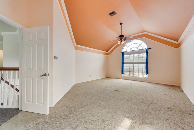 bonus room with vaulted ceiling, carpet floors, visible vents, and a ceiling fan