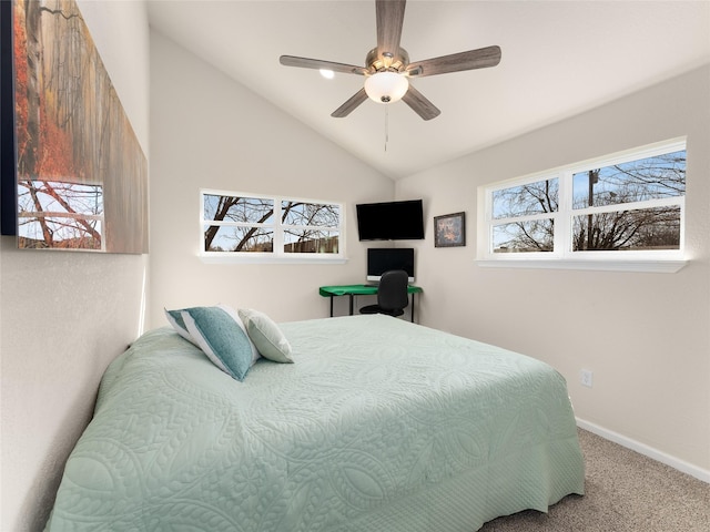 carpeted bedroom with lofted ceiling, ceiling fan, and baseboards