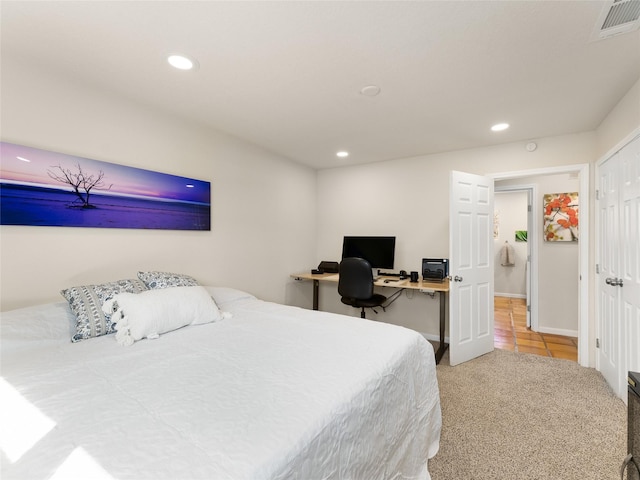 bedroom with recessed lighting, carpet flooring, and visible vents