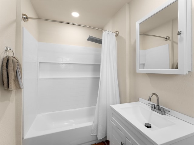 full bathroom with recessed lighting, vanity, and shower / bathtub combination with curtain