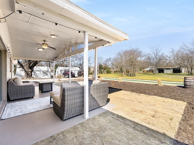 view of patio / terrace with a ceiling fan and an outdoor hangout area