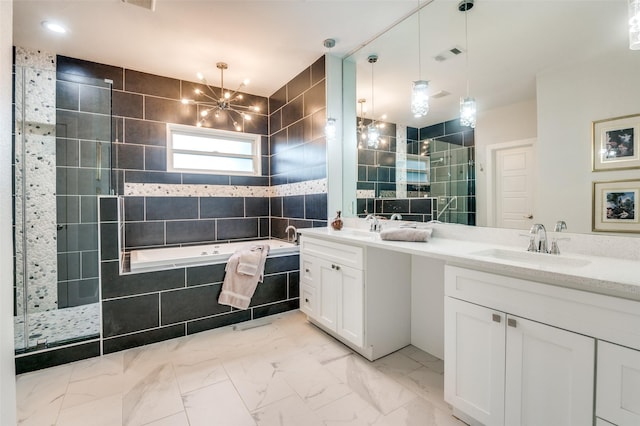 bathroom with visible vents, a sink, a shower stall, a bath, and marble finish floor