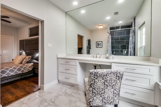 ensuite bathroom featuring visible vents, baseboards, recessed lighting, ensuite bathroom, and marble finish floor